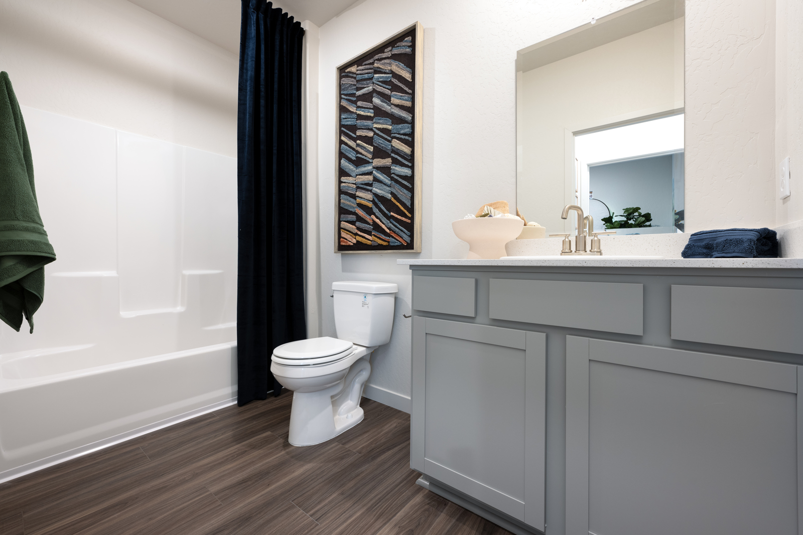 A bathroom with a toilet and sink.