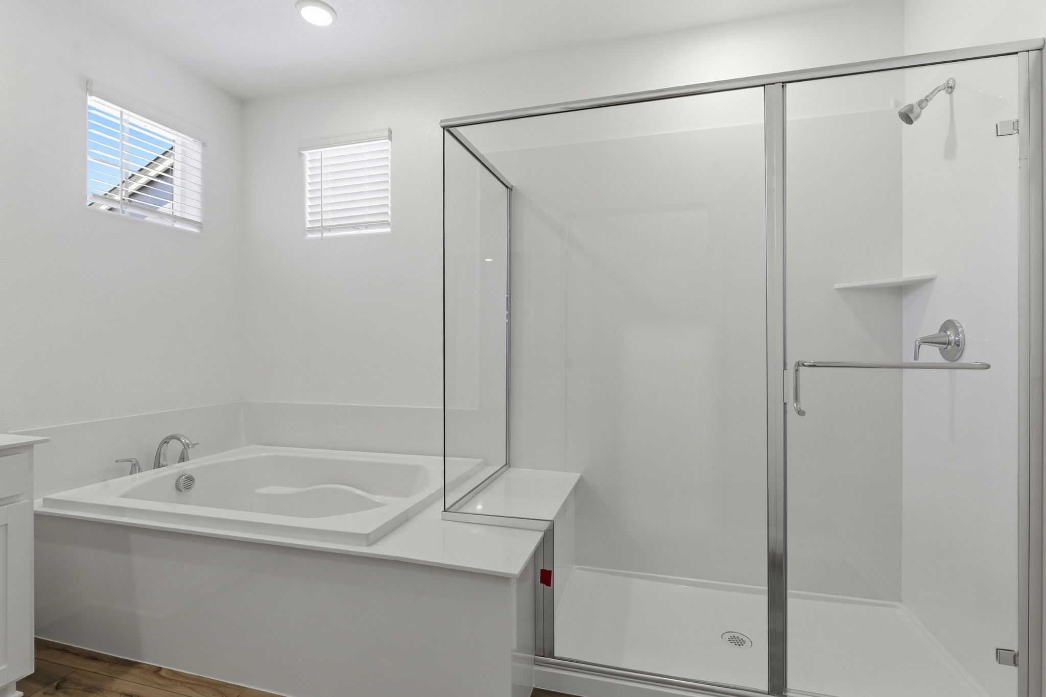 A bathroom with a glass shower.