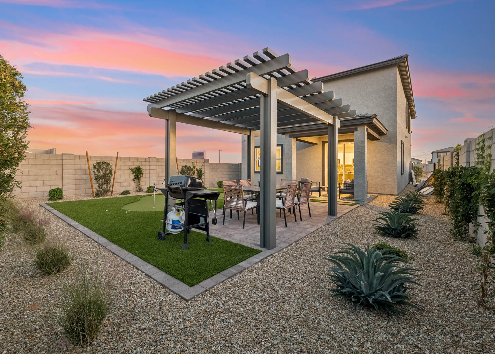 A house with a patio and a pool.
