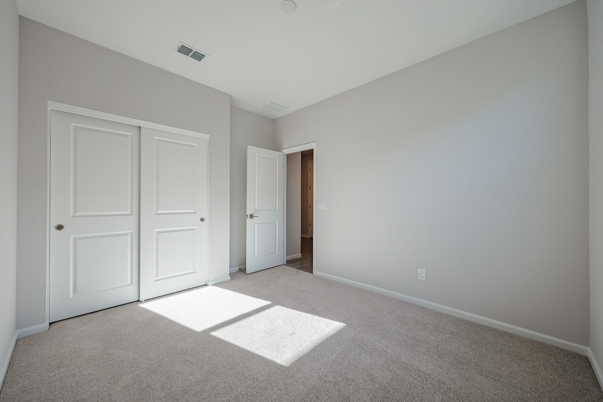 A room with white doors.