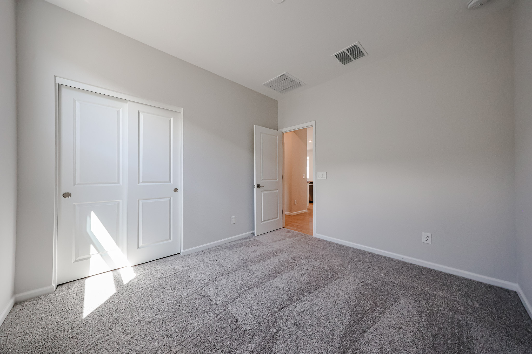 A room with white doors.