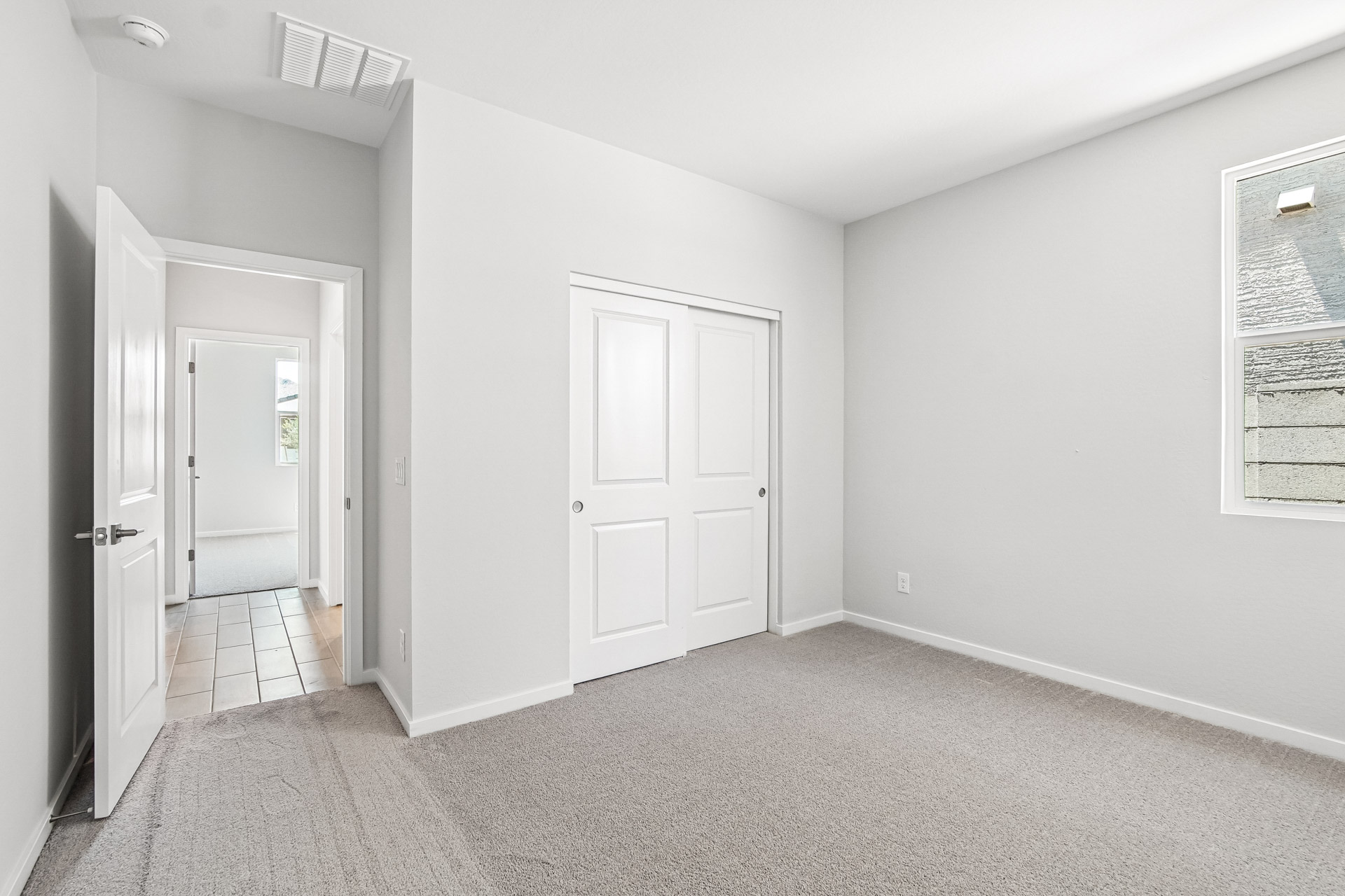 A room with white doors.
