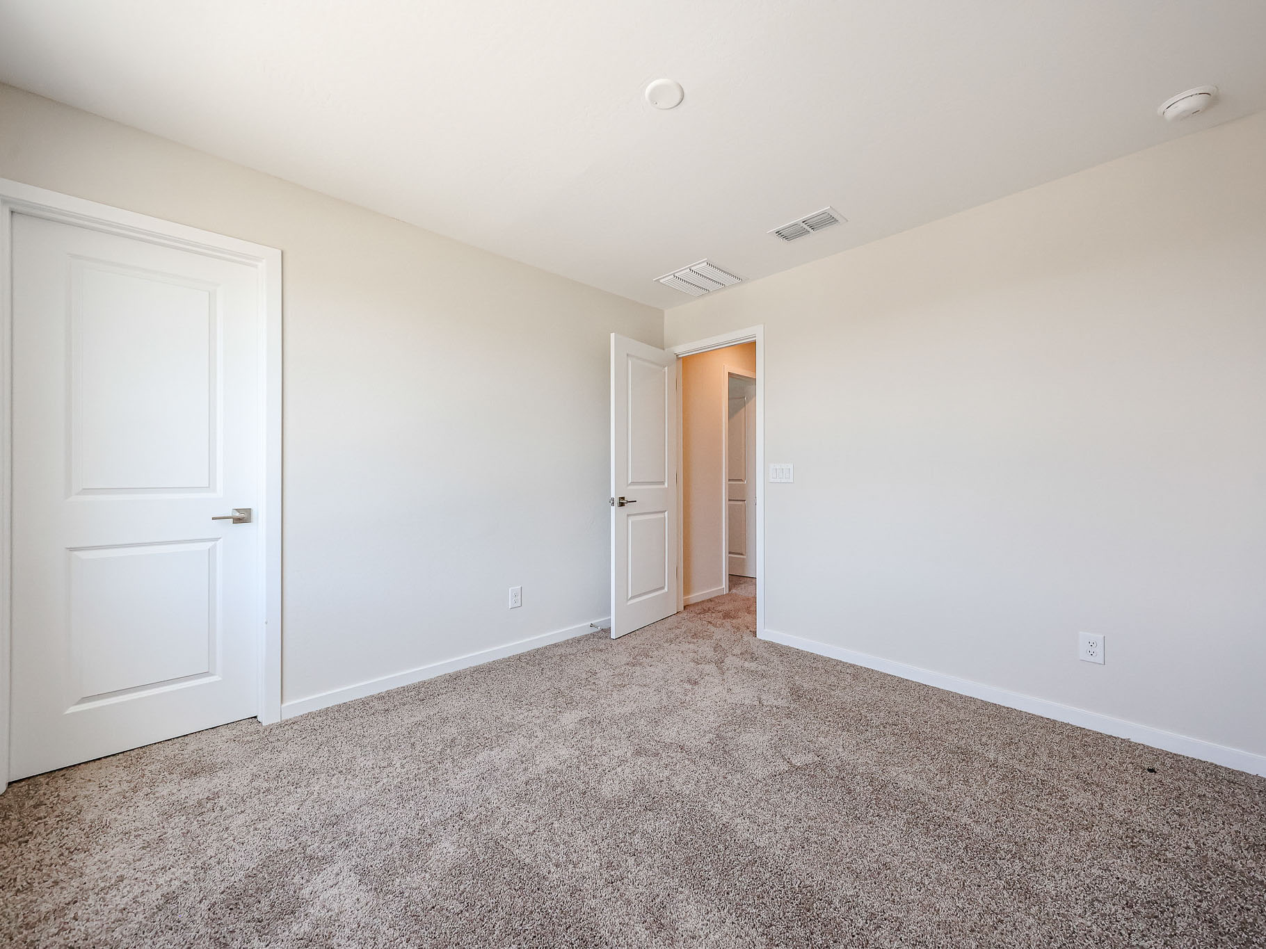 A room with white doors.