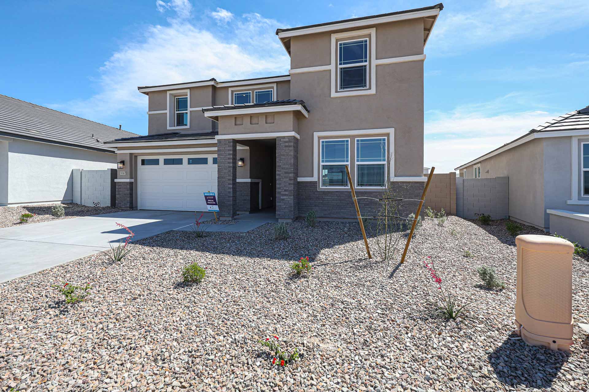A house with a yard and a fence.