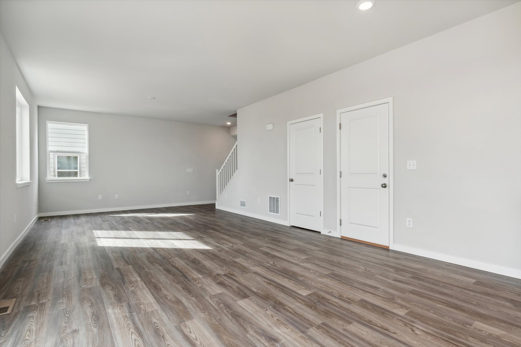 A room with white doors.