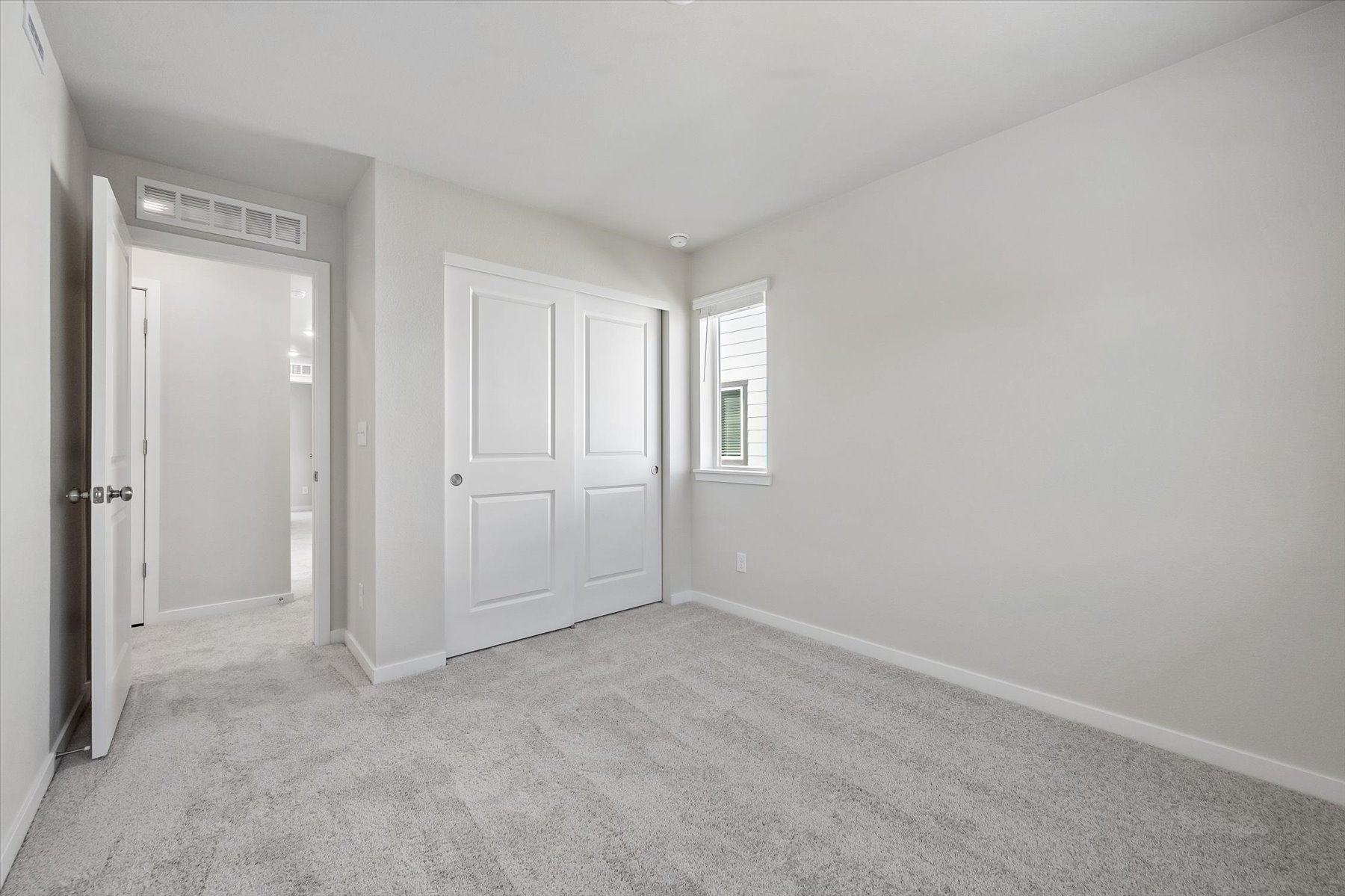 A room with white doors.