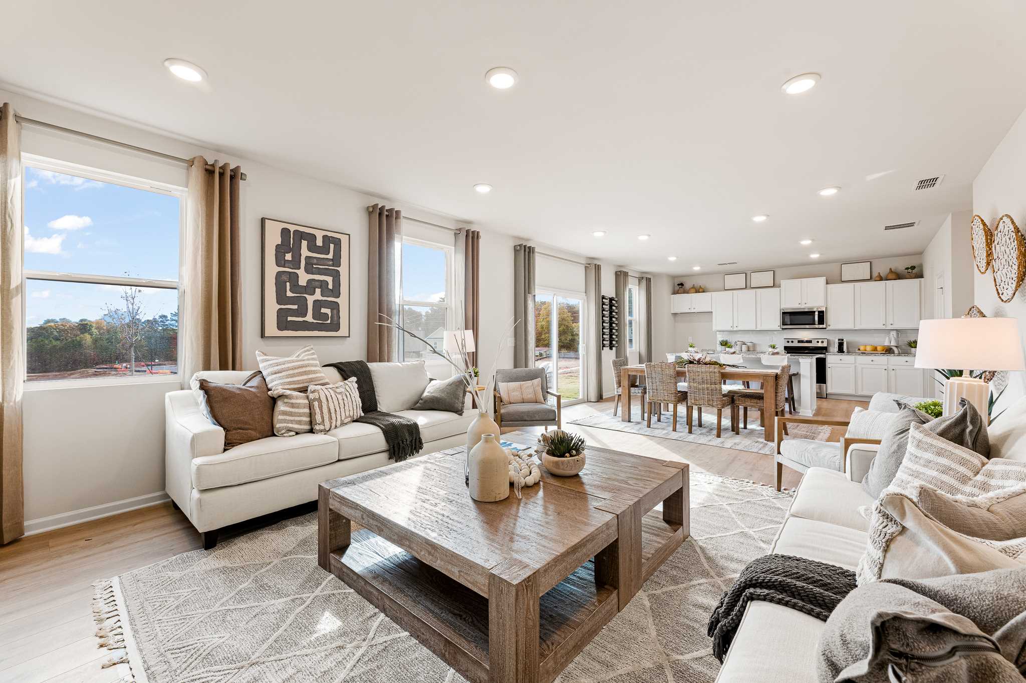 A living room with a large window.