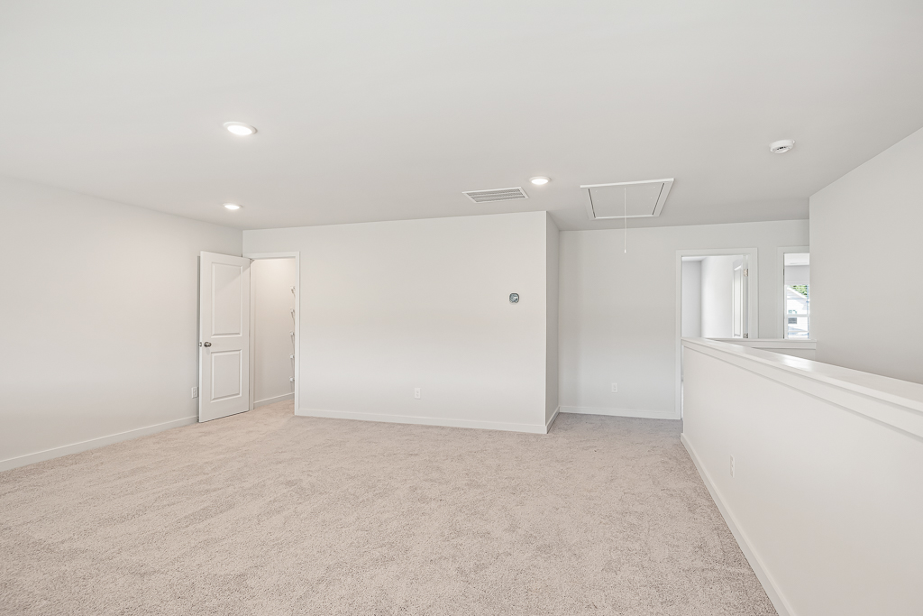 A room with white walls and a white counter.