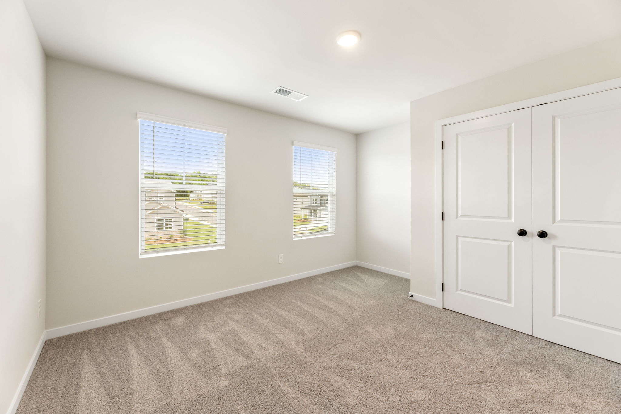 A room with white doors.