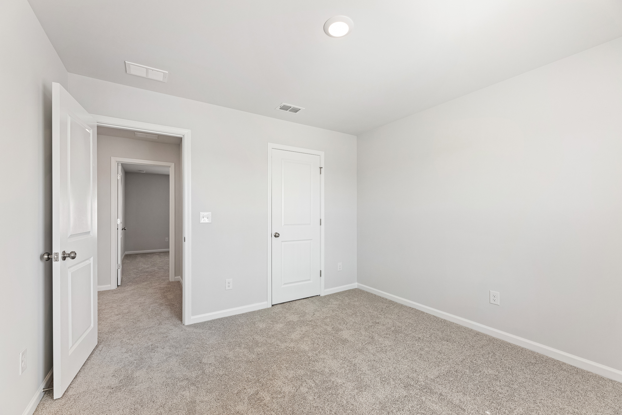 A room with white doors.