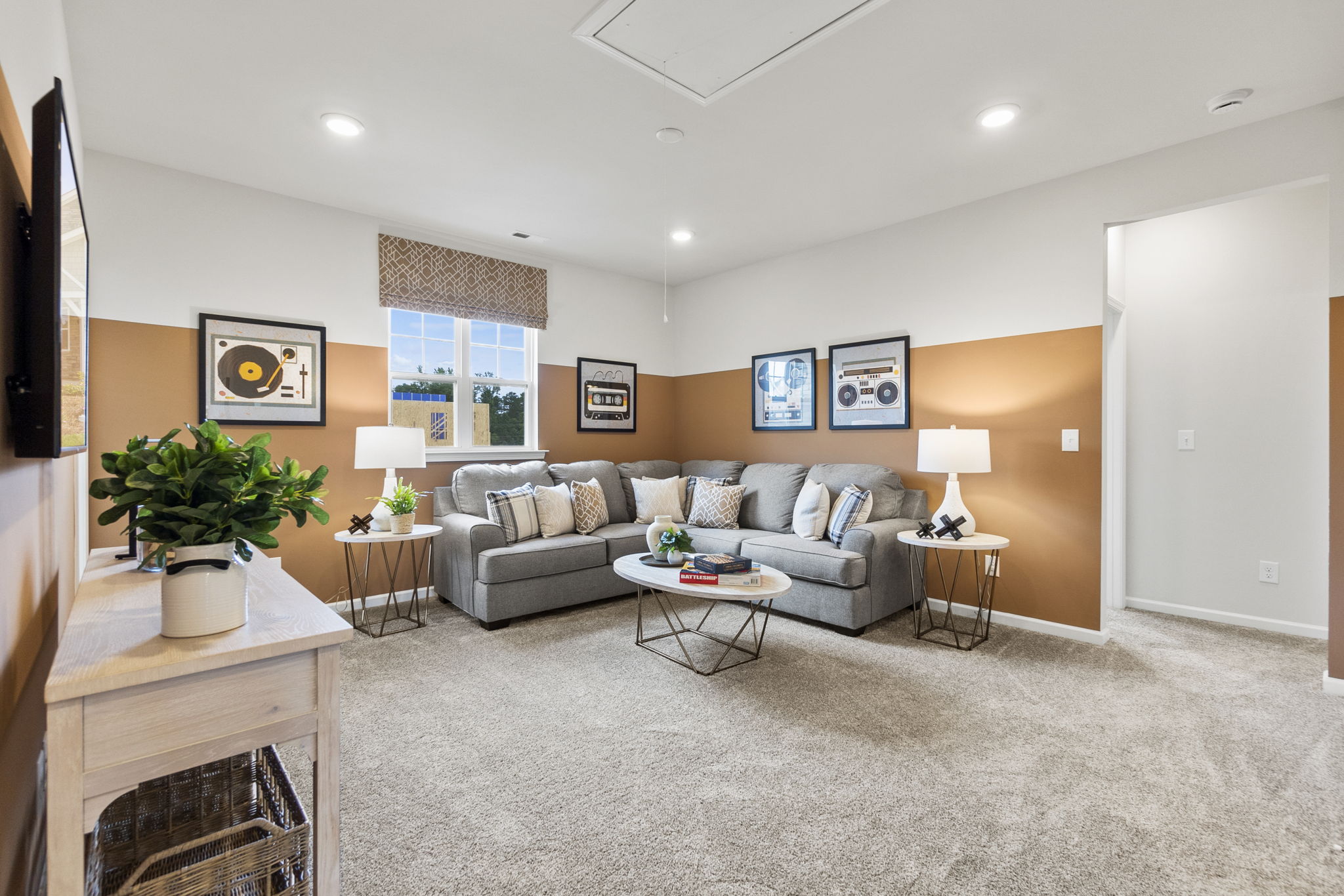 A living room with a couch and a coffee table.