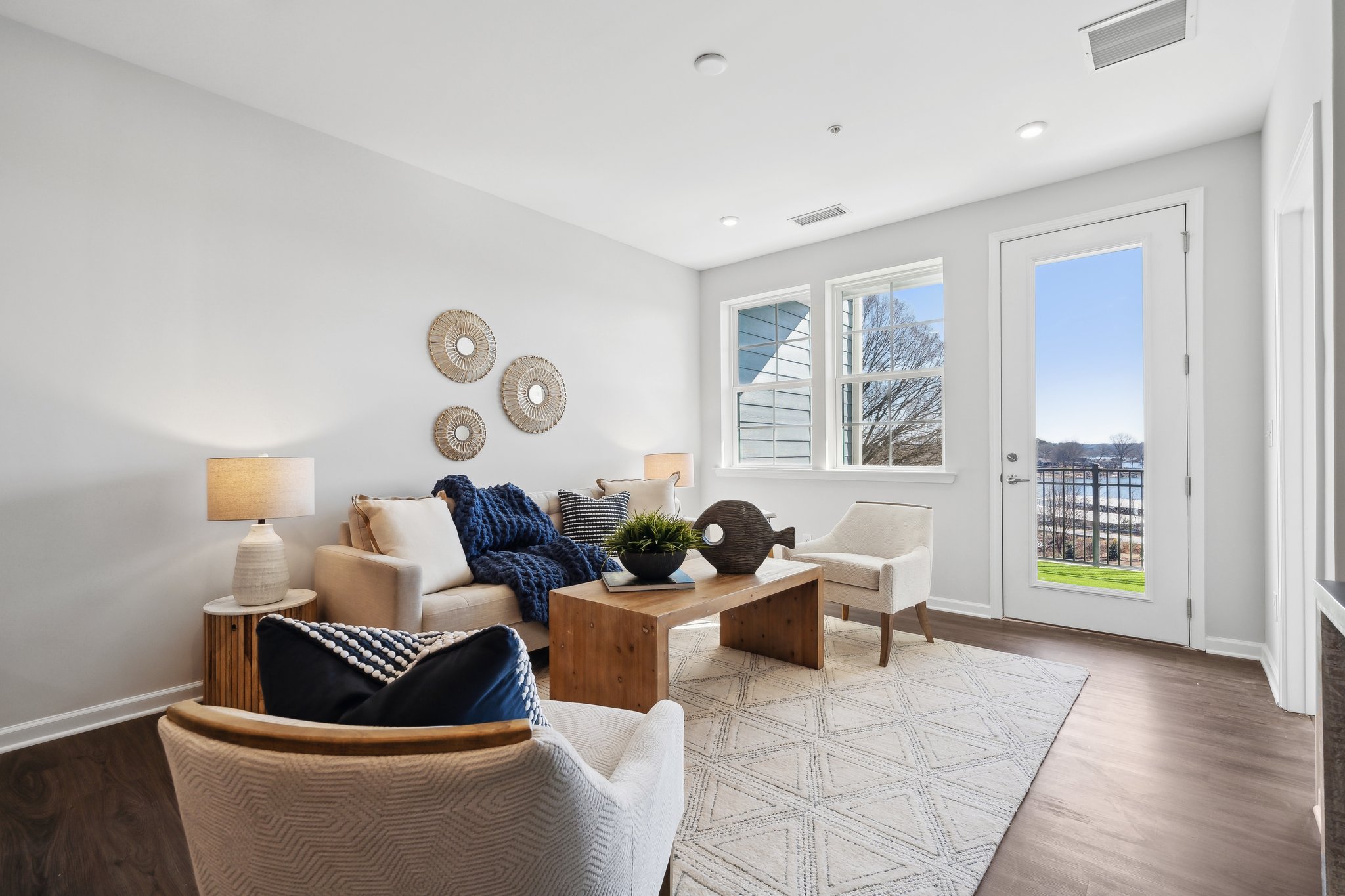 A living room with a couch and a table.