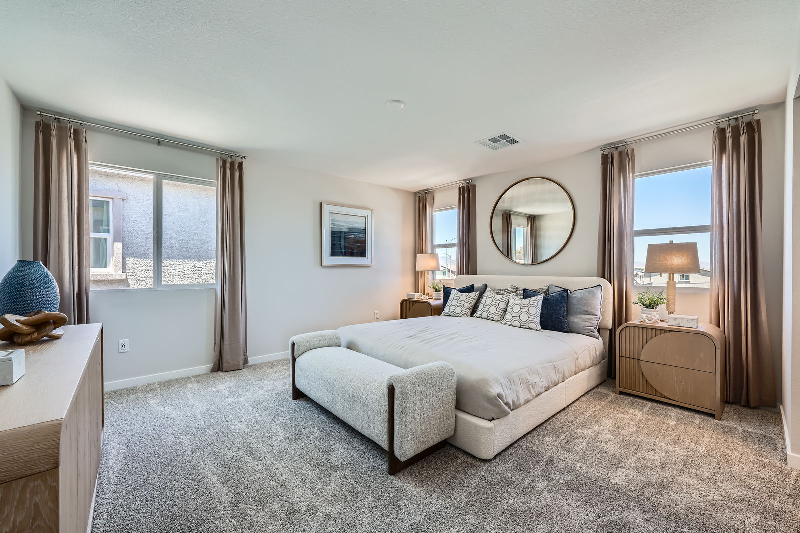 A bedroom with a large bed.