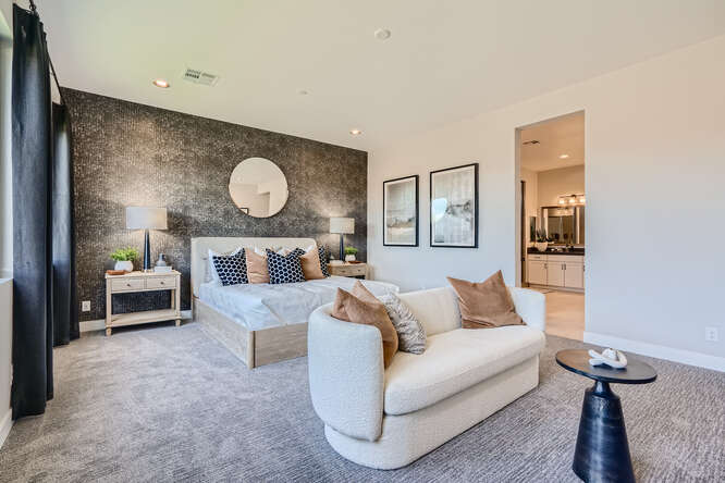 A living room with a couch and a table.