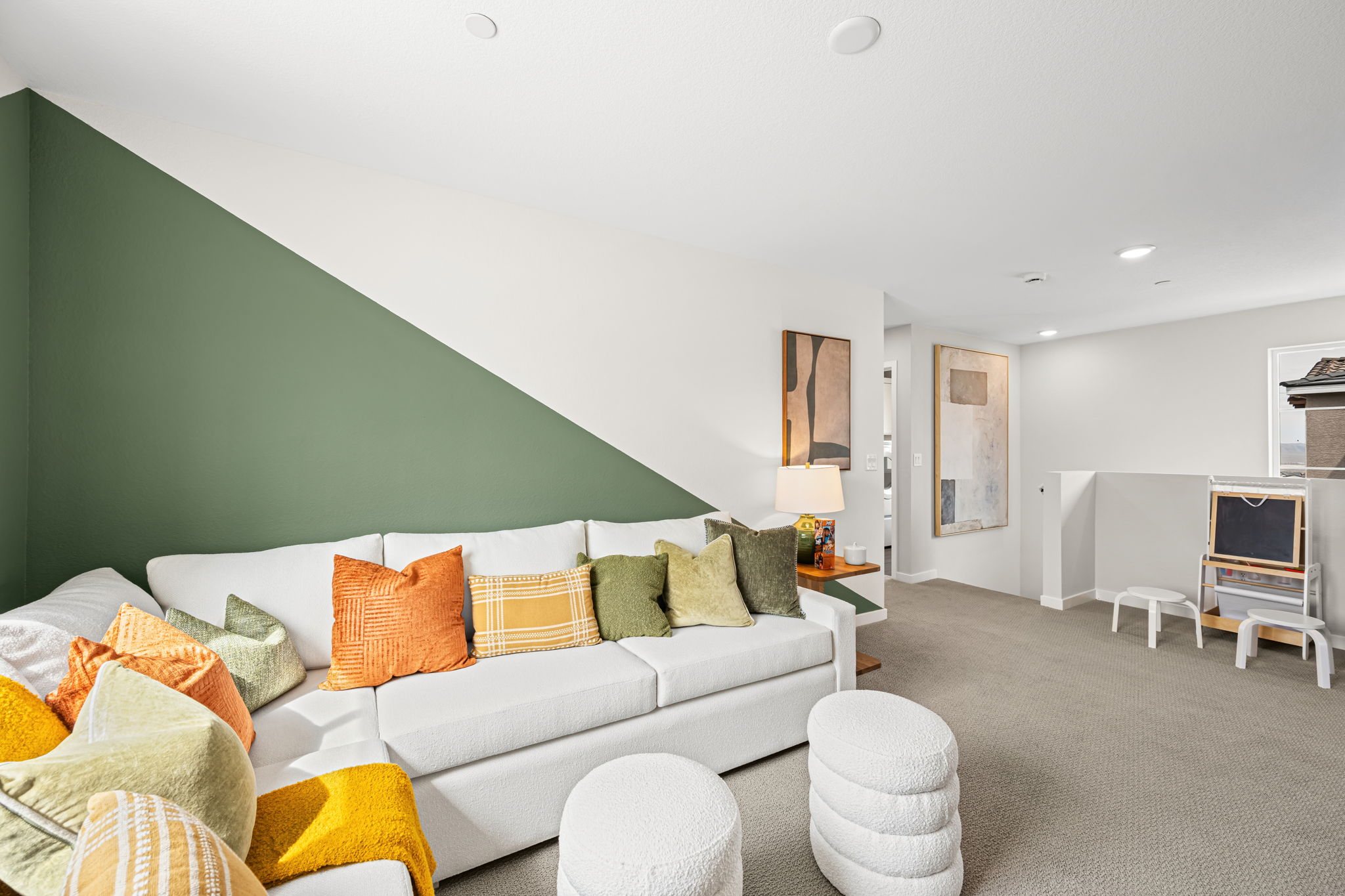 A living room with a couch and a tv.