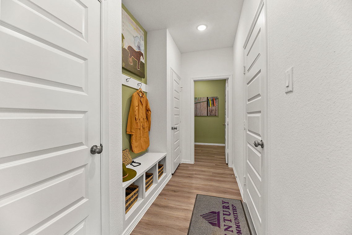 A hallway with white walls.