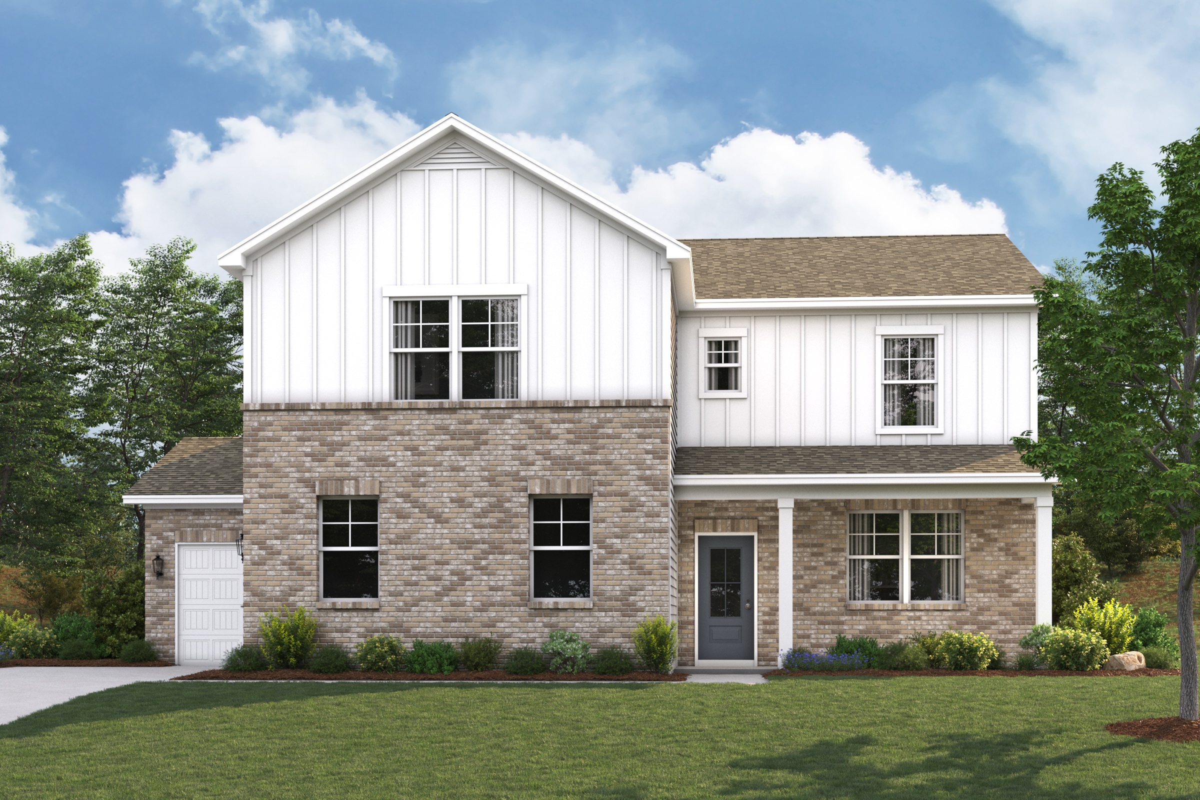 A large house with a lawn in front of it.