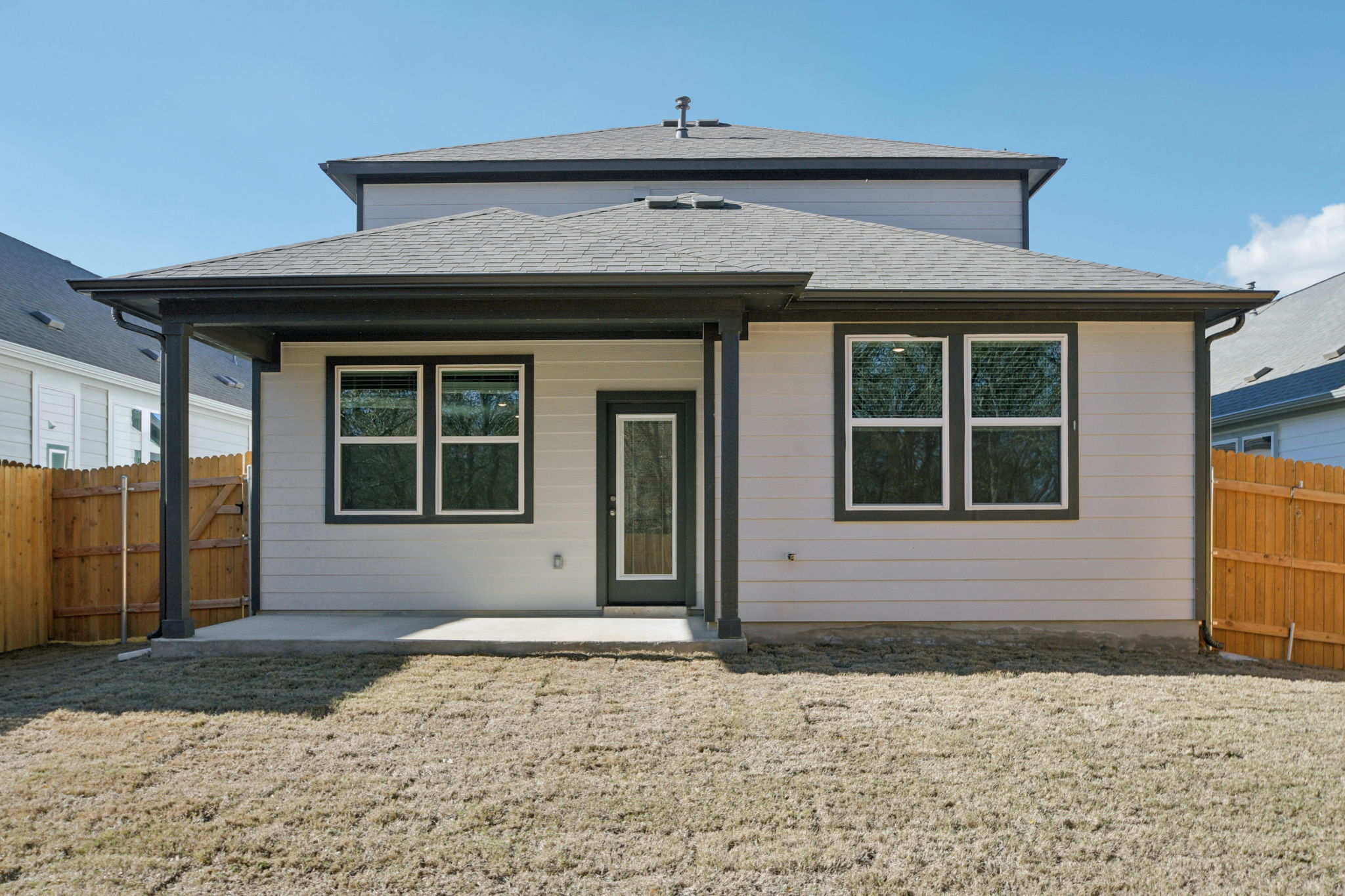 A house with a fence around it.