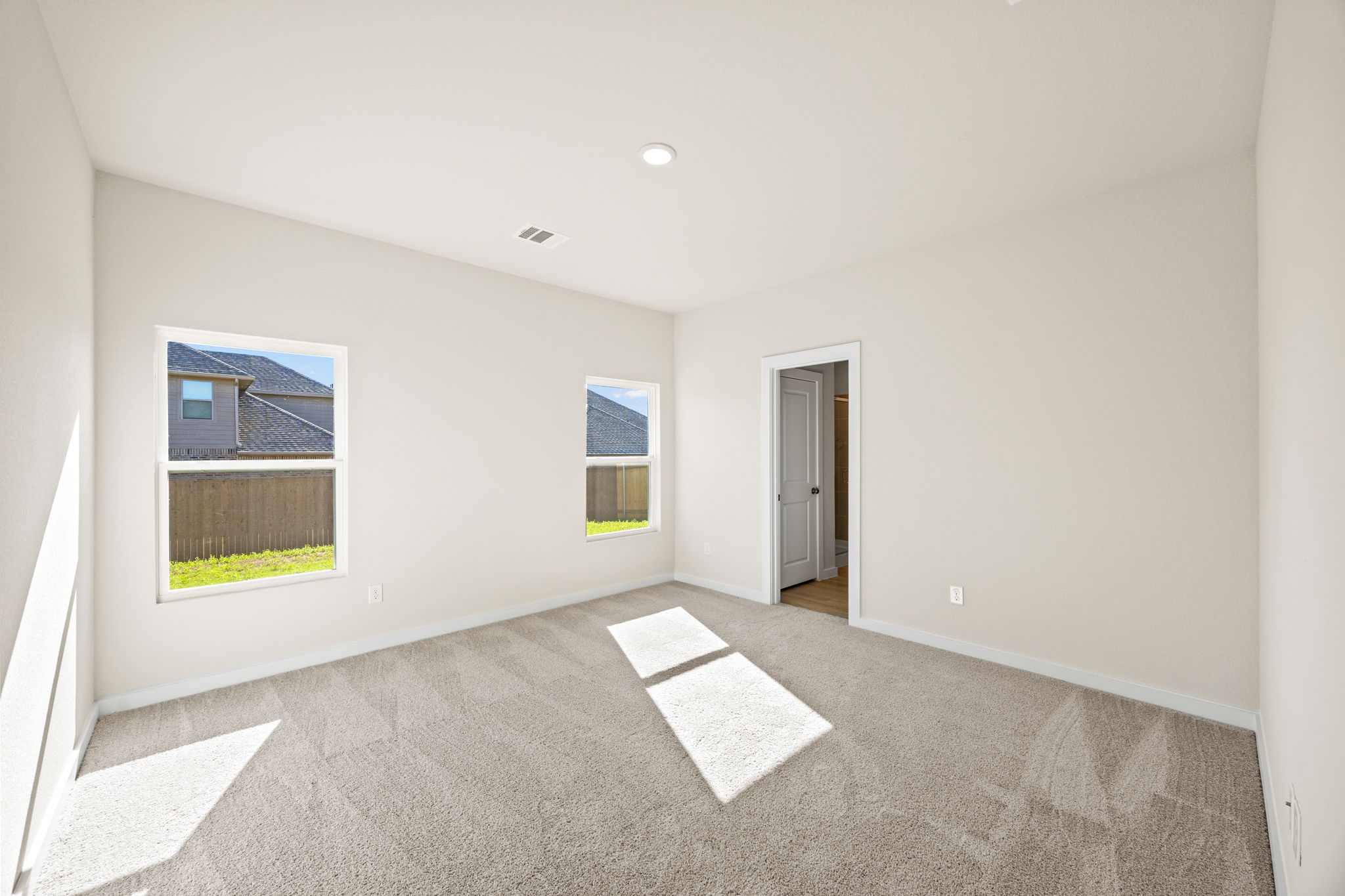 A room with a rug and a rug.