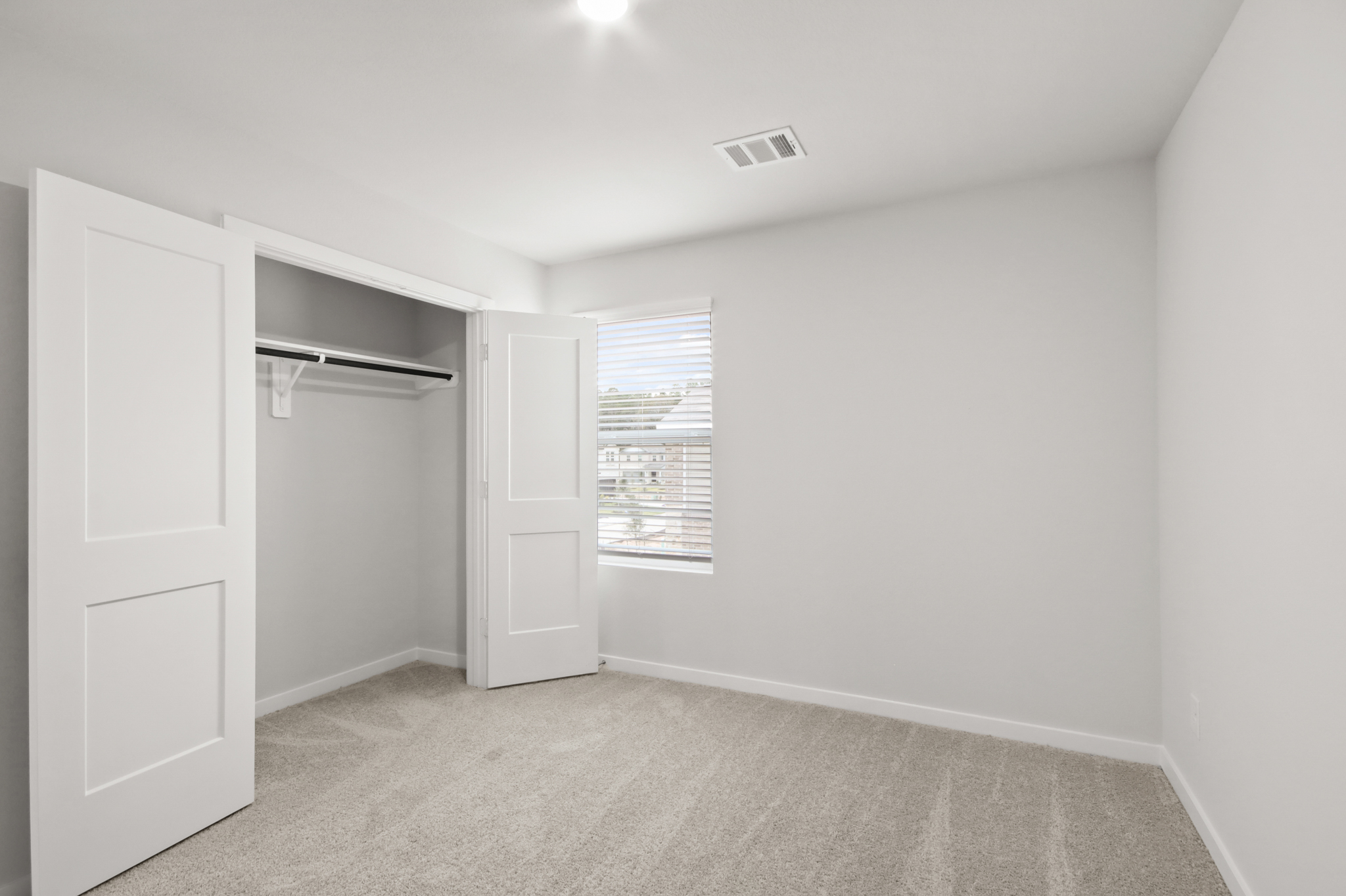 A room with white doors.