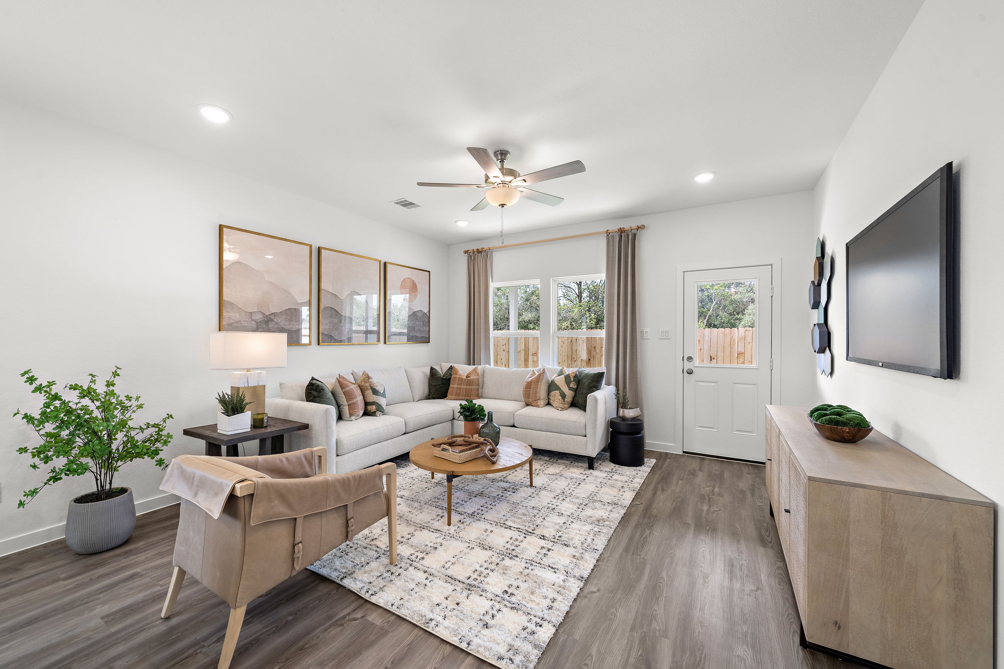 A living room with a couch and a table.