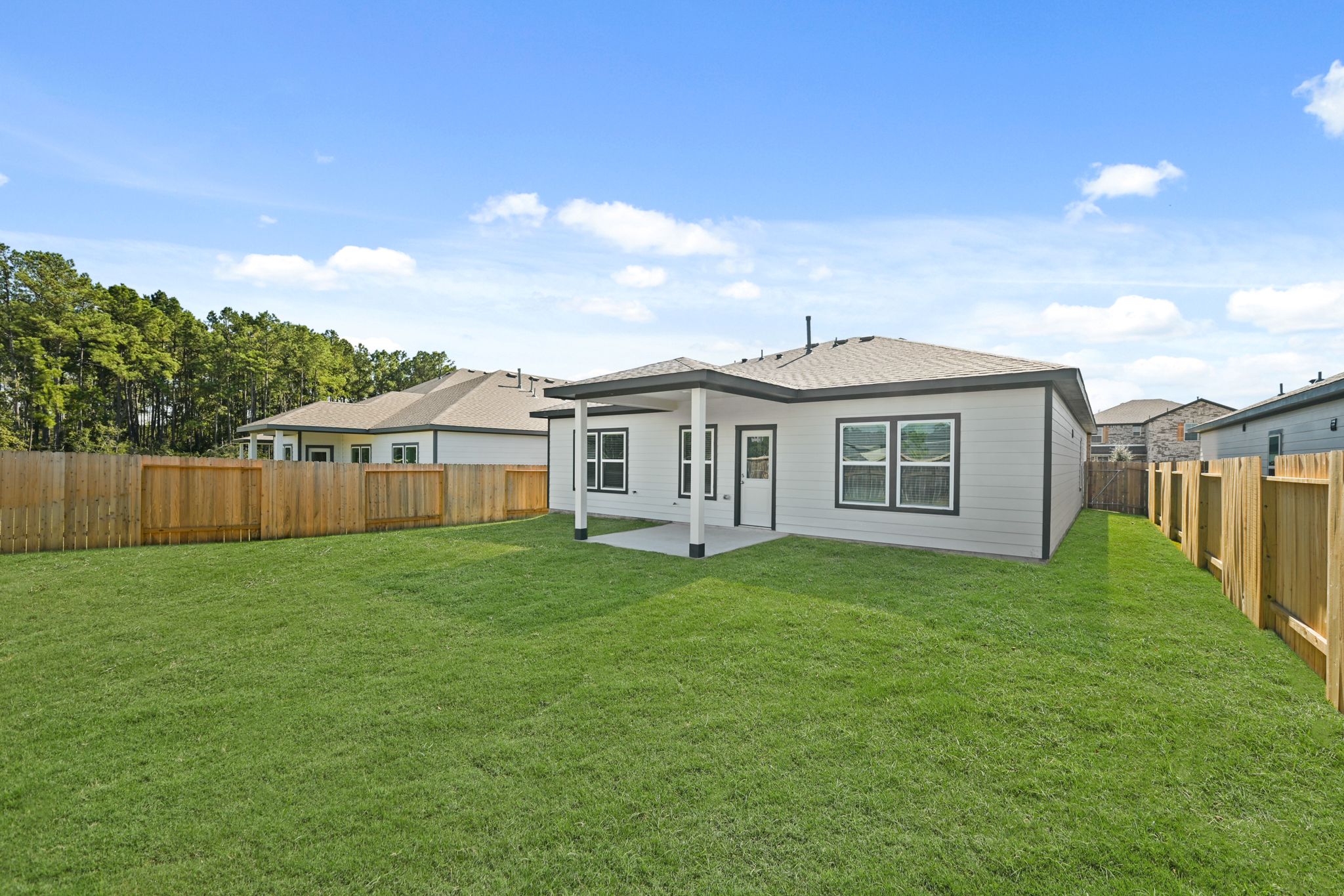 A house with a fence around it.