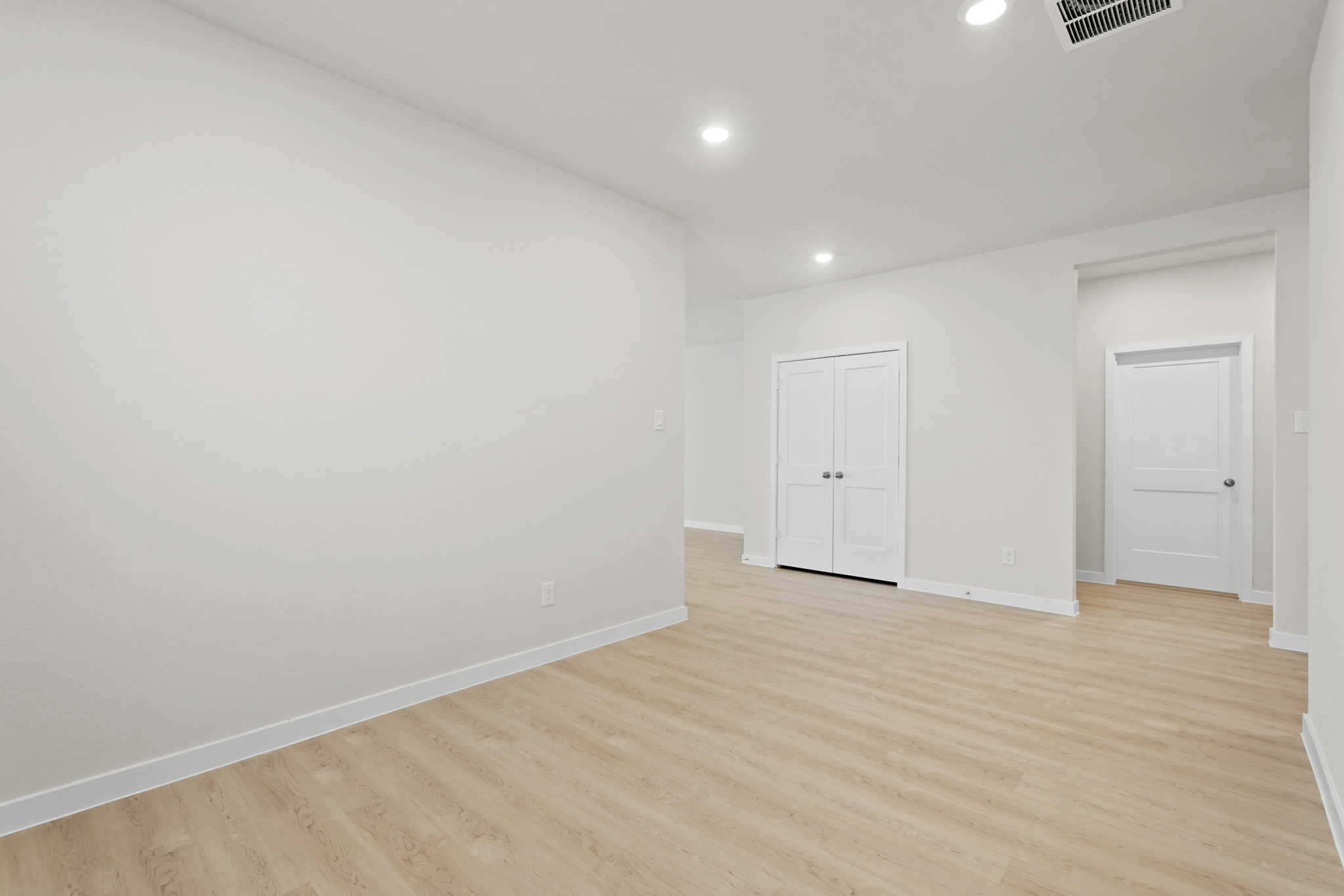 A room with white doors.