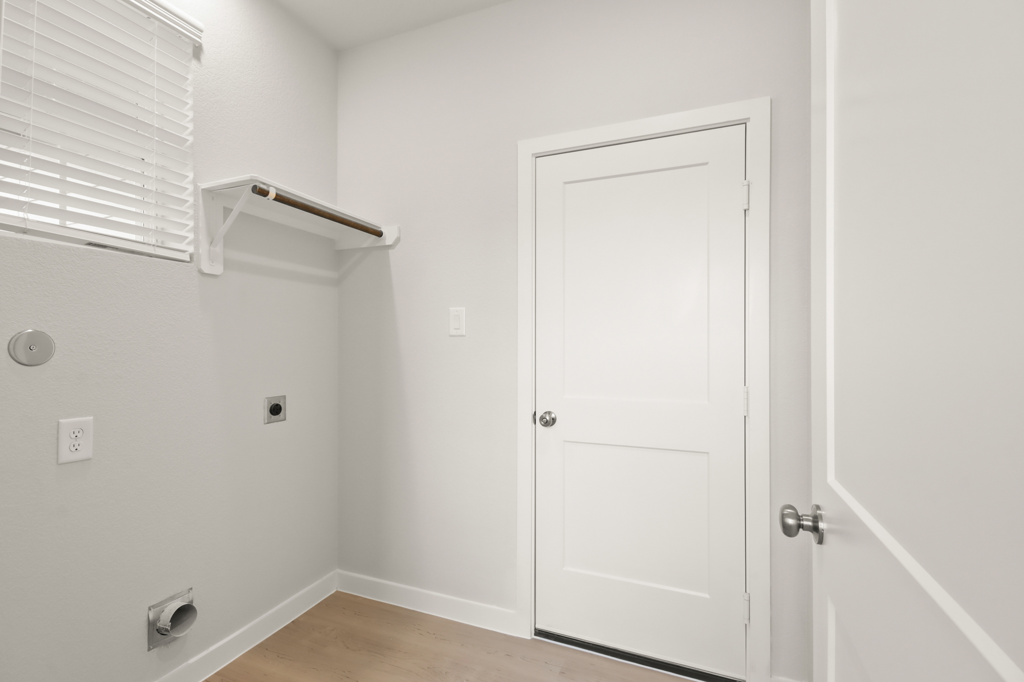 A white door in a room.