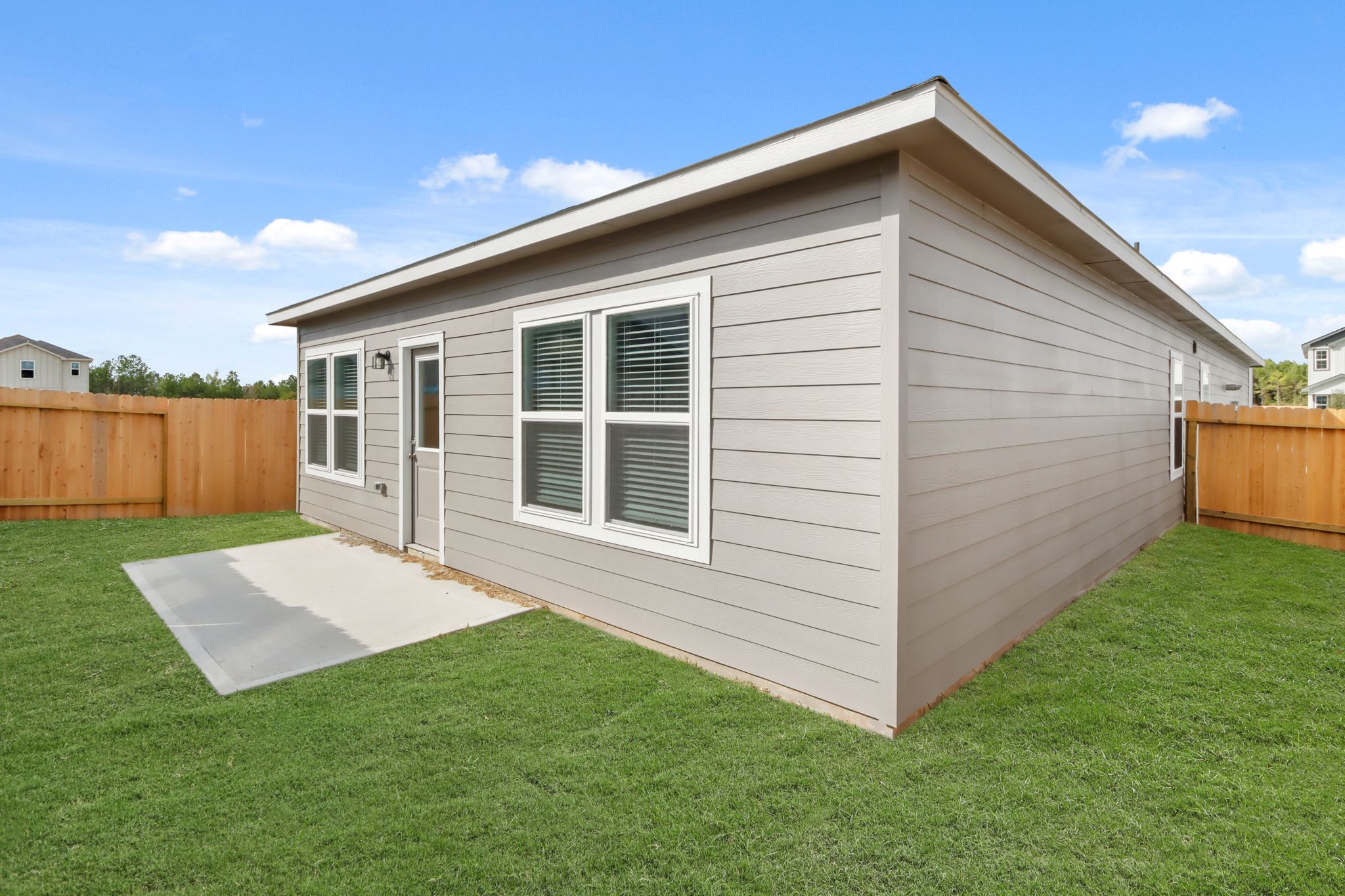 A house with a fence around it.