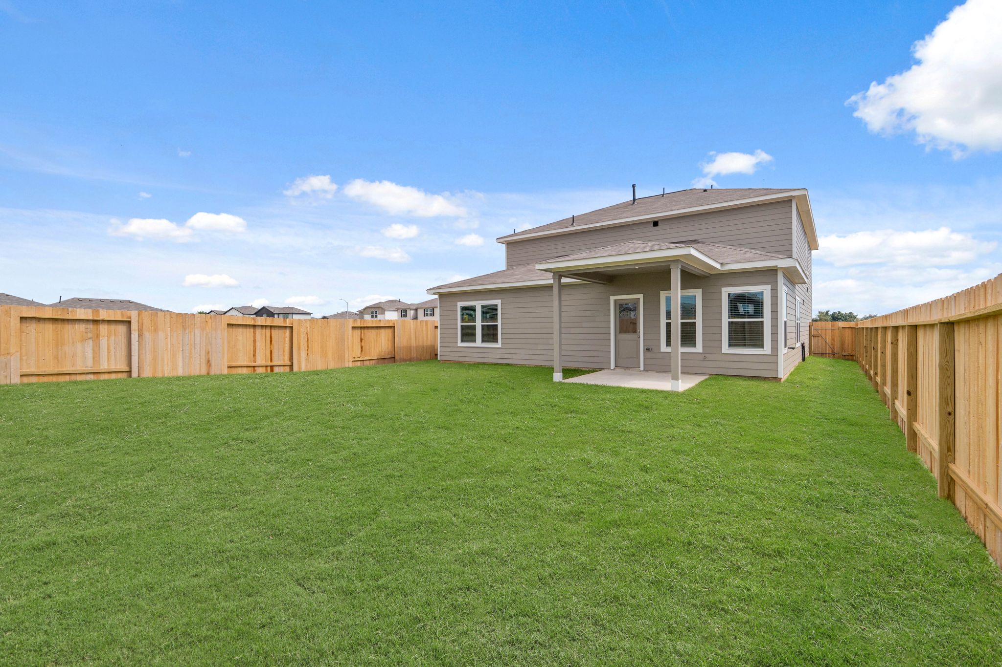 A house with a fence around it.
