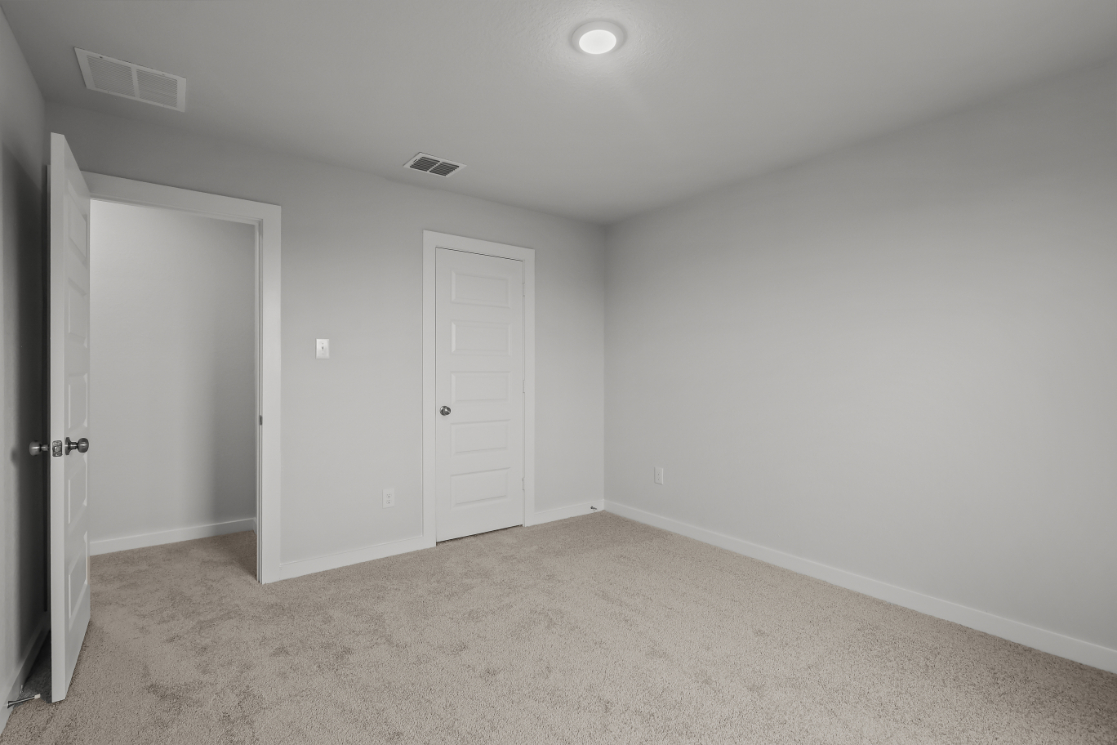 A room with white doors.