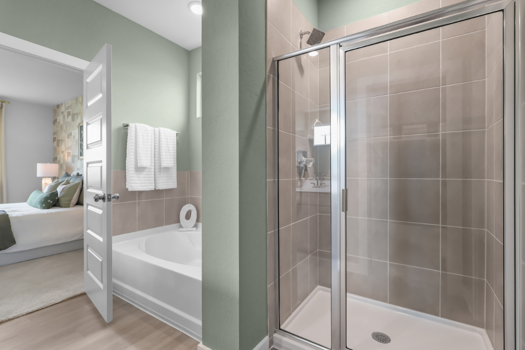 A bathroom with a glass shower.