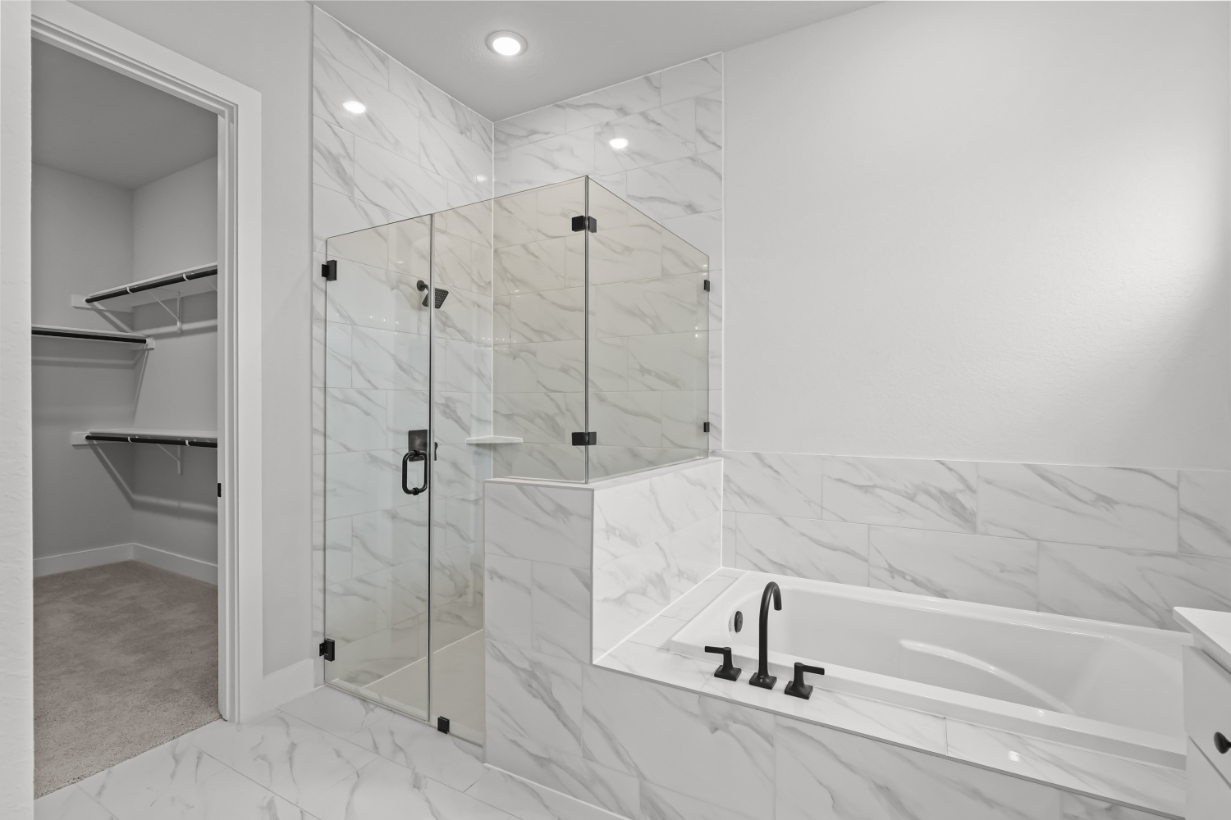 A bathroom with a glass shower.