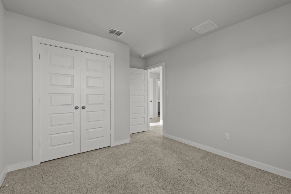 A room with white doors.