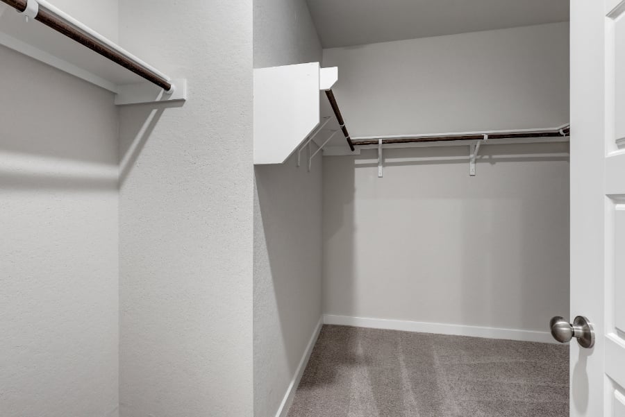 A hallway with white walls.