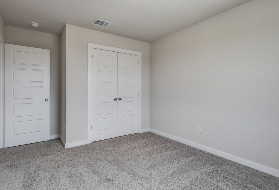 A room with white doors.