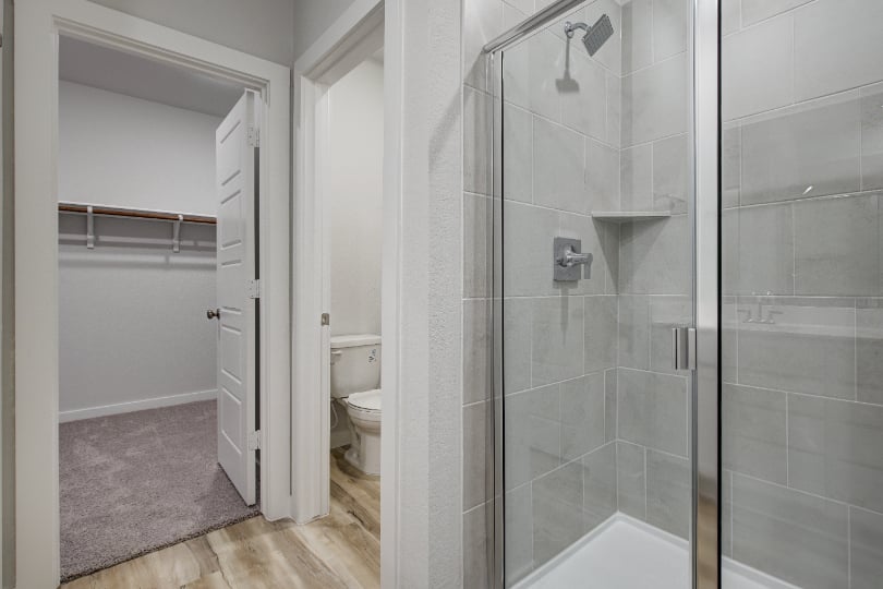 A bathroom with a glass shower.