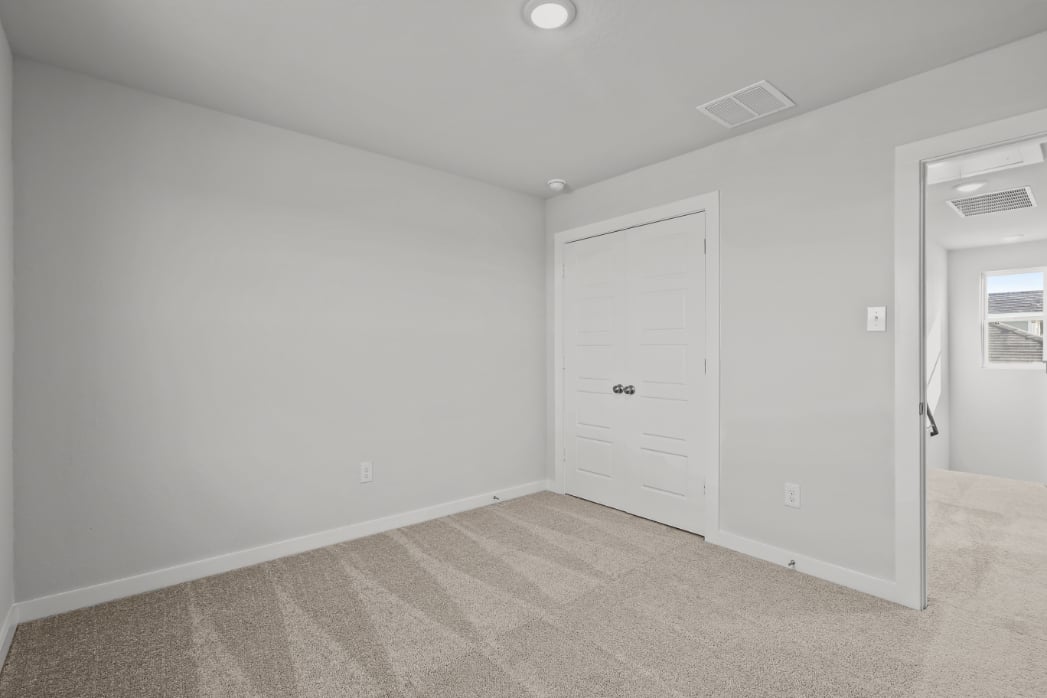 A room with white doors.