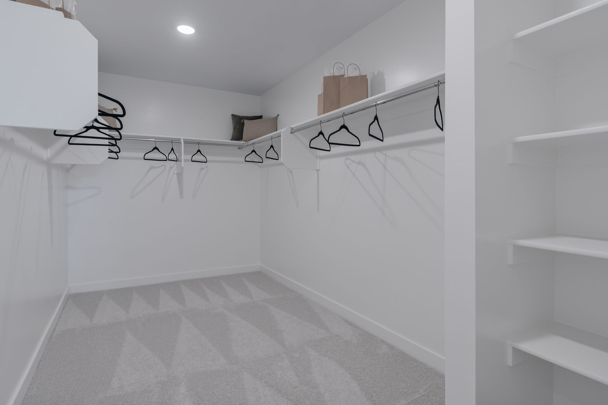 A white bathroom with a white tile floor.