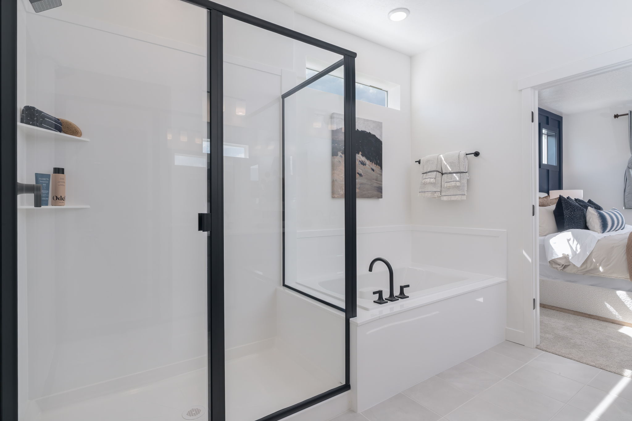 A bathroom with a glass shower.