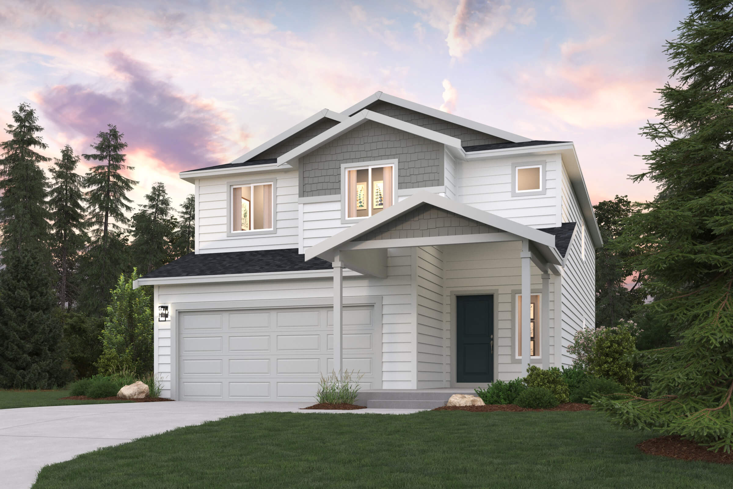 A house with a garage and trees around it.