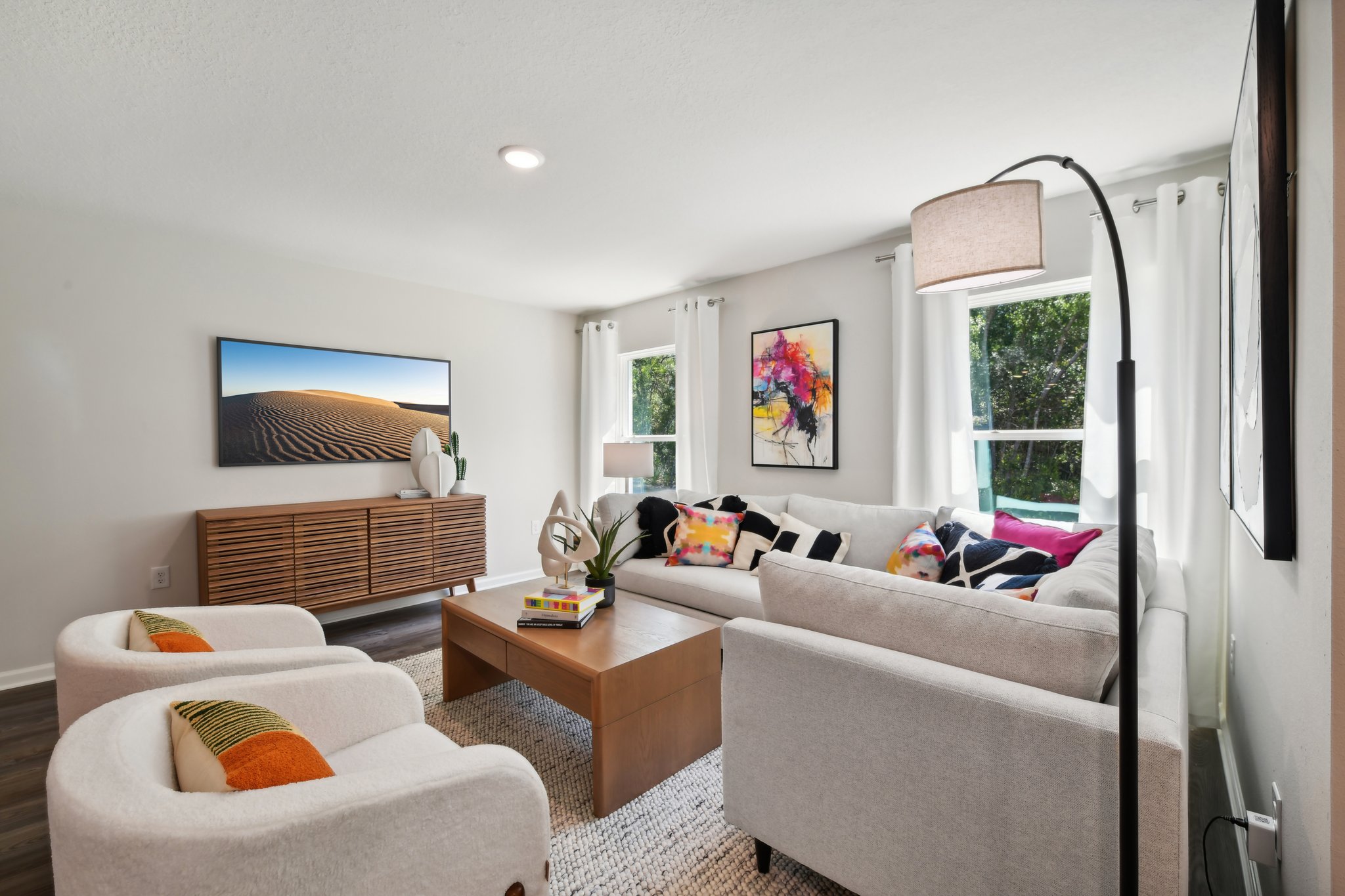 A living room with a couch and a table.