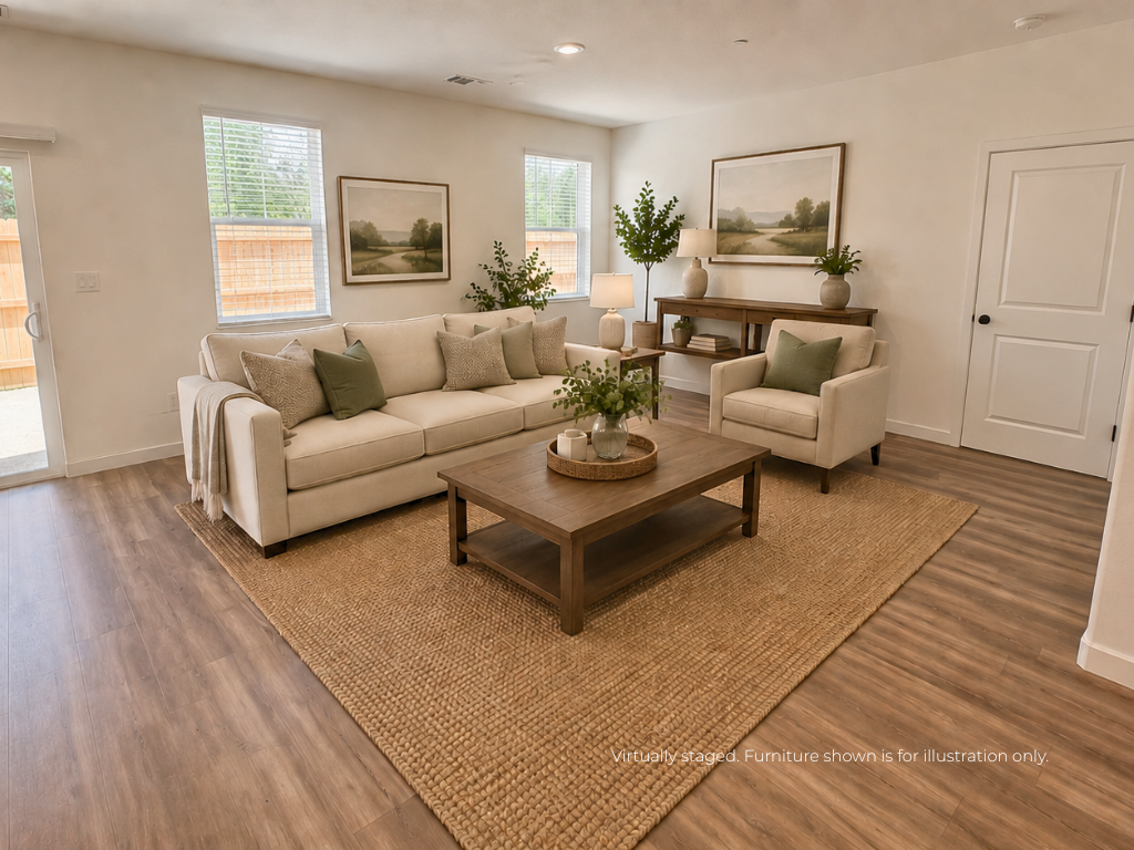 A living room with a couch and coffee table.